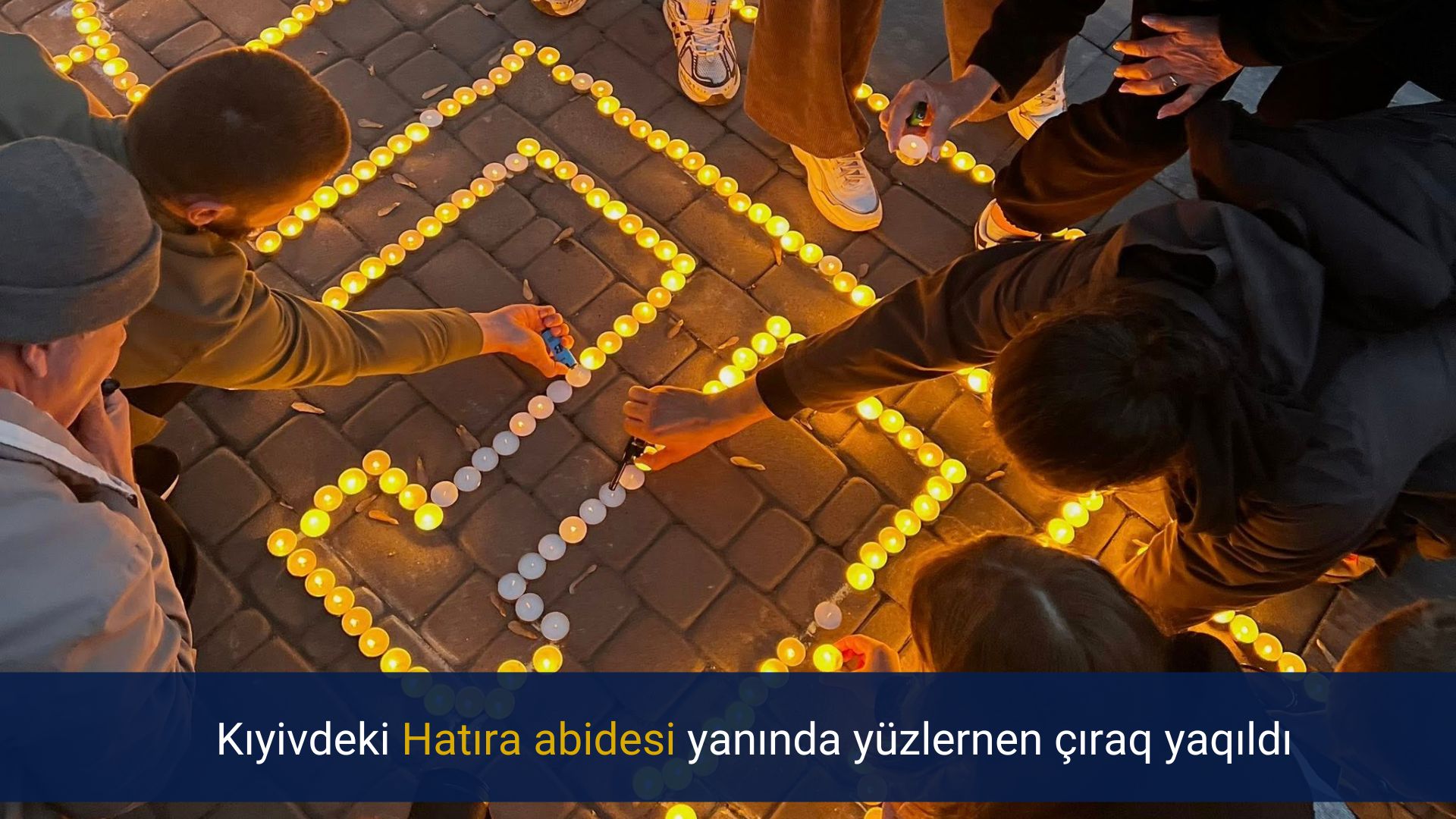 Kıyivdeki Hatıra abidesi yanında yüzlernen çıraq yaqıldı